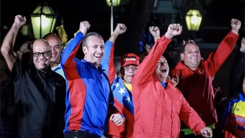 EPA The mayor of Caracas Jorge Rodriguez (L), The Vice President of Venezuela Tareck El Aissami (2-L), the Minister of Electrical Energy Luis Alfredo Motta Dominguez (C) and the first vice president of the ruling United Socialist Party of Venezuela (PSUV) Diosdado Cabello (2-R), attend an event celebrating the election results after a national vote on President Nicolas Maduro"s proposed Constituent Assembly at Plaza Bolivar in Caracas, Venezuela, 31 July 2017