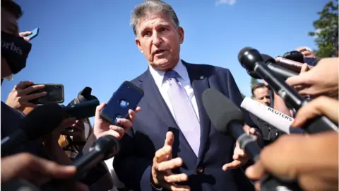 Getty Images Manchin denied being a 'liberal' at Thursdays press conference