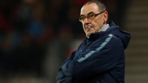 Maurizio Sarri looks dejected