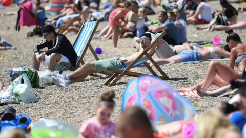 EPA Sunbathers on the beach at Southend-on-Sea, Essex