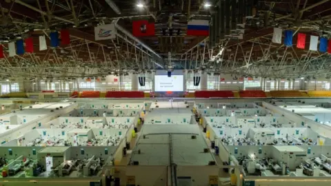  Denis Grishkin/Moscow News Agency via Reuters Temporary hospital in the Krylatskoye Ice Palace, Moscow