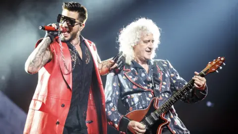 Getty Images Adam Lambert and Brian May from Queen