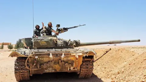 AFP A Syrian tank near Tanf, 12 June