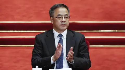 Getty Images Guangdong Communist Party Secretary Hu Chunhua attends opening session of the Chinese People's Political Consultative Conference on 3 March 2016 in Beijing, China.