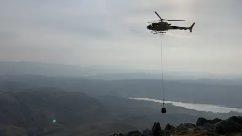 Fix the Fells Helicopter lifting stones to Coniston Old Man