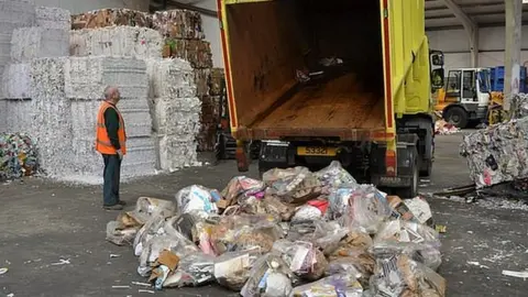 BBC Guernsey kerbside recycling being delivered for sorting and baling