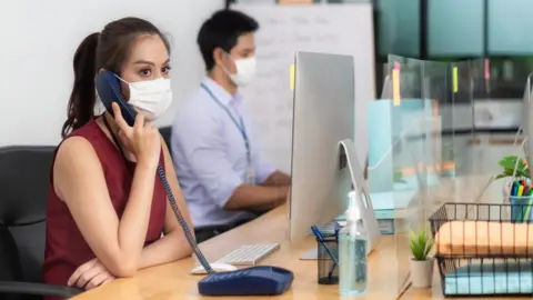 Getty Images Office workers