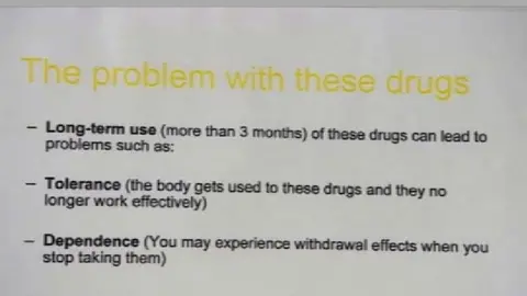 Poster at Falls surgery in Belfast warning of the dangers of long term prescription medication