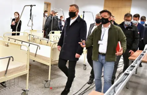EPA Mr Duda visited a field hospital under construction to Poland on Friday