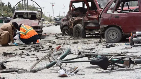 EPA Suspected suicide bomb blast outside a polling station in Quetta