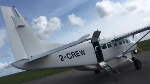 Waves Cessna 208 Caravan plane