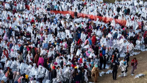 Getty Images Migrants in Eagle Pass on 19 December