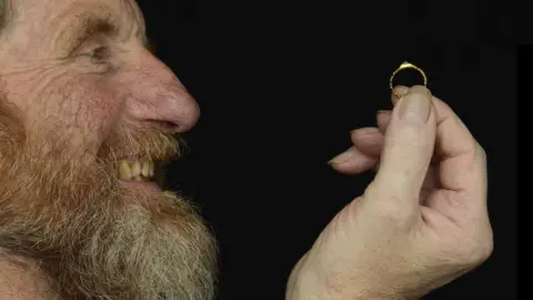 Noonans David Board with the medieval gold ring he found