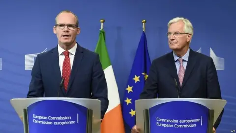 AFP Michel Barnier (right) with Irish foreign minister Simon Coveney