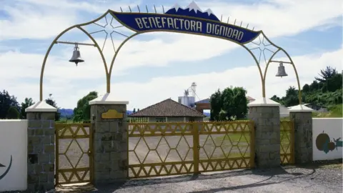 Getty Images An entrance gate at the former Colonia Dignidad