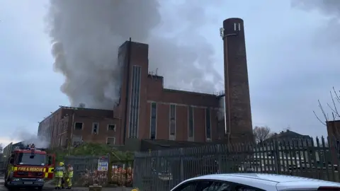 LFRS smoke rises above waster premises in Port Royal Avenue