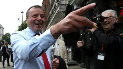 AFP Arron Banks arriving at a Commons select committee meeting