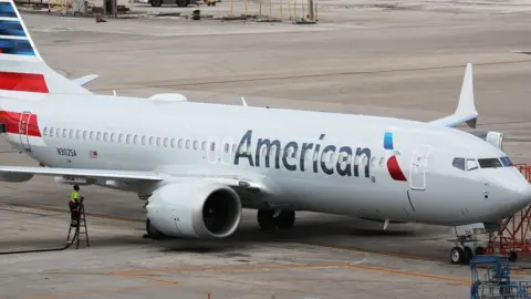 Getty Images A grounded American Airlines Boeing 737 Max 8 is seen parked at Miami International Airport on March 14, 2019 in Miami, Florida.