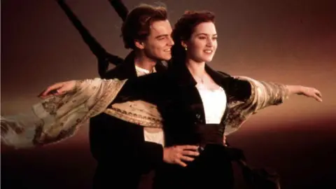 United Archives GmbH / Alamy Stock Photo Leo DiCaprio and Kate Winslet in a scene from the film Titanic