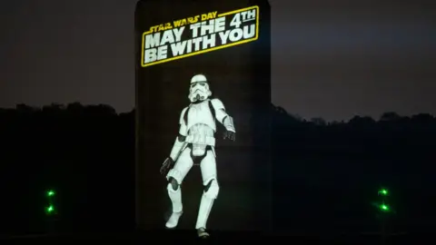 Motion Mapping A projection of a Stormtrooper on Orwell Bridge