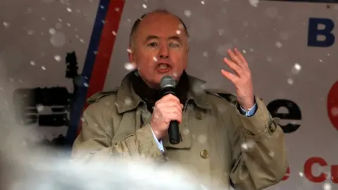 PA Media Jack Dromey addressing a Birmingham Council workers rally in 2010