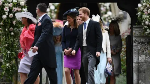 Getty Images Prince Harry leaves Pippa Middleton's wedding ceremony with guests