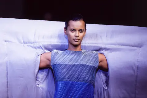 Getty Images A model at Issey Miyake's Ready-to-Wear, Fall-Winter 1995-96 collection show in Paris, France