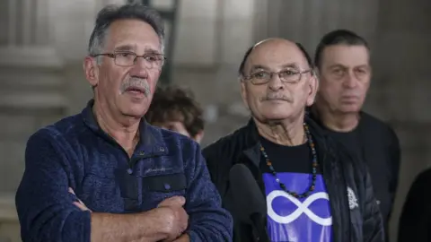 JOHN WOODS/The Canadian Press Richard Beauvais (left) and Eddy Ambrose were switched at birth nearly 70 years ago