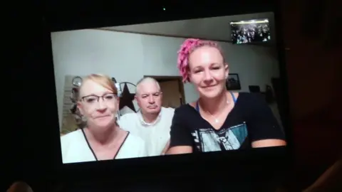 Bruce Glikas/WireImage Reality Winner, right, seen on a Zoom call.