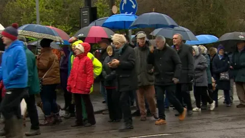 Crowds taking part in the walk