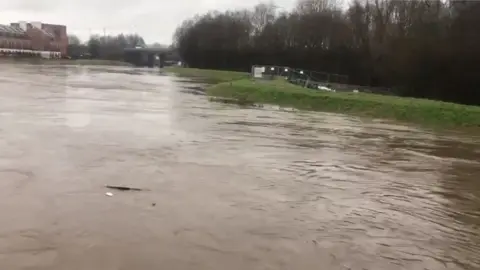 Juiced Up Media The access road to Didsbury Golf club on Ford Lane is now currently closed to all public due to the River Mersey bursting its banks