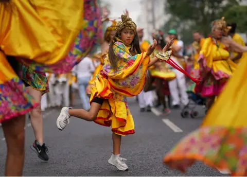 Victoria Jones/PA Wire Parade at Notting Hill Carnival