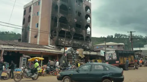 AFP This photo taken on June 16, 2017 in Bamenda shows a hotel destroyed by a fire, allegedly attributed to a radical separatist movement demanding the independence of the Anglophone region from the rest of Francophone Cameroon.