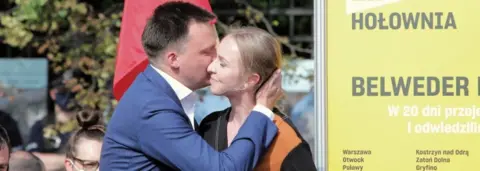 EPA Urszula Brzezinska-Holownia with husband Szymon Holownia