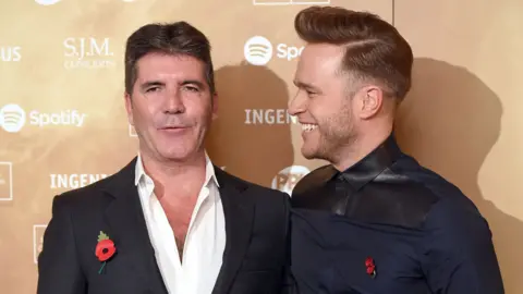 Getty Images Simon Cowell and Olly Murs