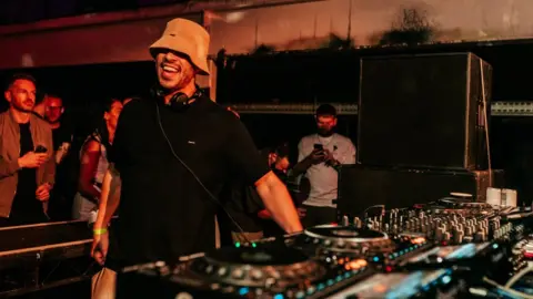 Connor Baker Melvo Baptiste DJing