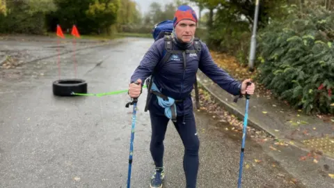 Dominic Renshaw with the tyre