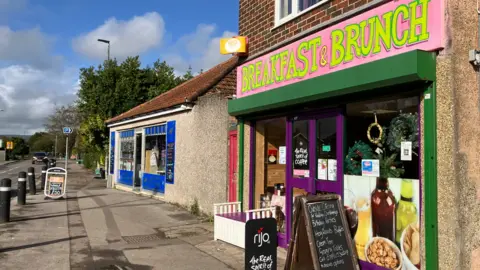 Photo of a cafe and butchers