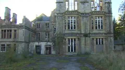 A wing of the hospital complex hit by fire