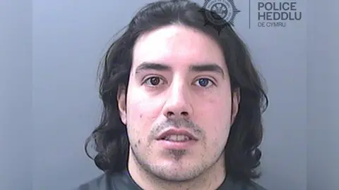 South Wales Police Police custody shots of one man