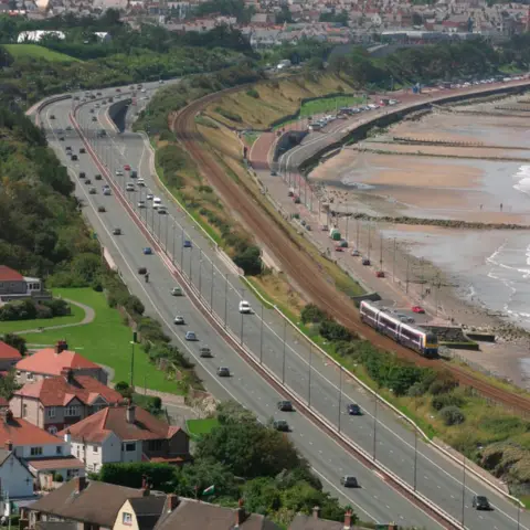 Getty Images The A55 and north Wales railway line is near the coast