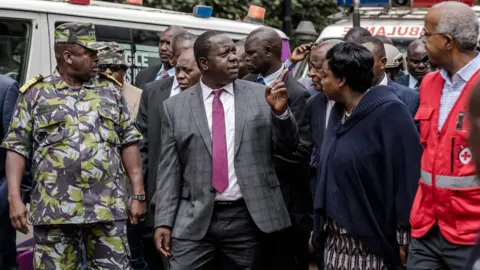 AFP Kenyan Interior Minister Fred Matiangi at the scene of the attack