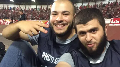 Maher Mezahi Maher and a colleague