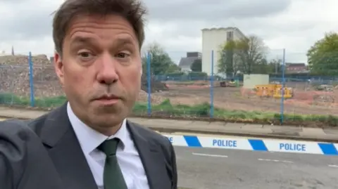 BBC Look East's Jon Ironmonger reports from a town centre that has been partially sealed off.