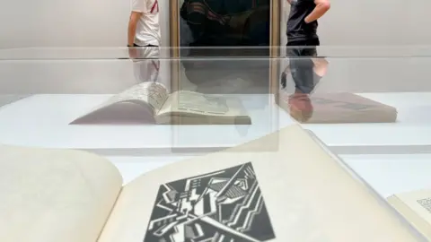 Leeds Art Gallery Display case with magazine picture of Atlantic City painting