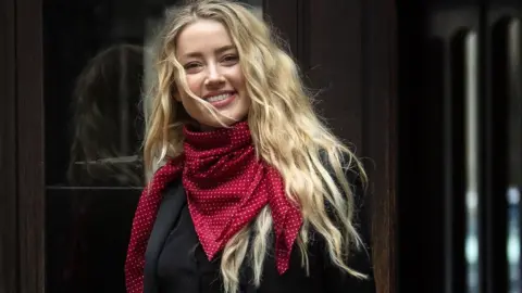 PA Media Actress Amber Heard arrives at the High Court in London for a hearing in Johnny Depp's libel case against the publishers of The Sun and its executive editor, Dan Wootton.