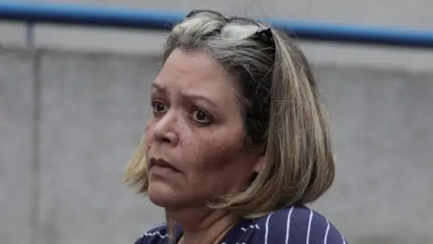 Reuters Venezuelan judge Maria Afiuni pictured outside her house after news of her release broke on 5 July 2019