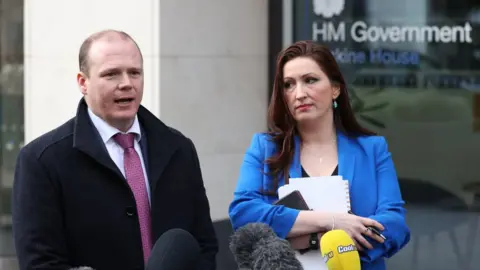 PA Media Gordon Lyons and Emma Little-Pengelly