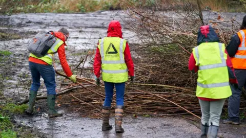 Simon Jacobs  Volunteers clearing the river