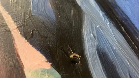 Lorna May Wadsworth Close up of damage to painting